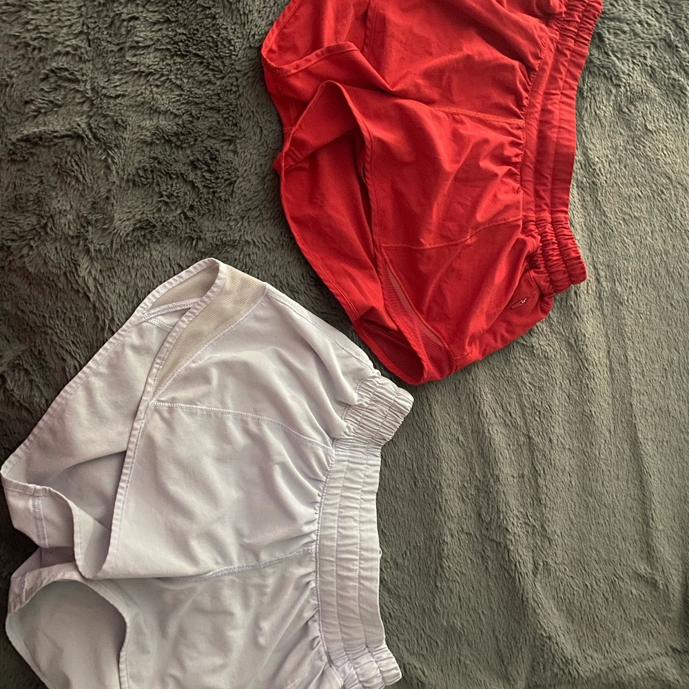 2 pack of 2.5 hot hots size 4 lululemon shorts (red and lavender)